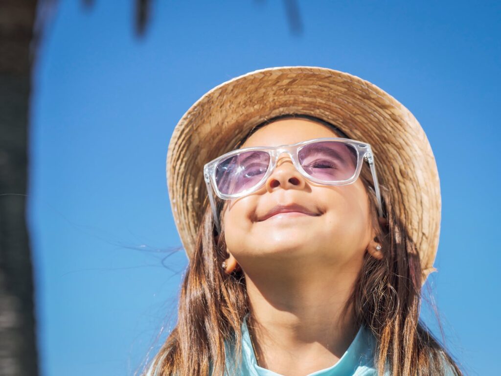 girl wearing a hat